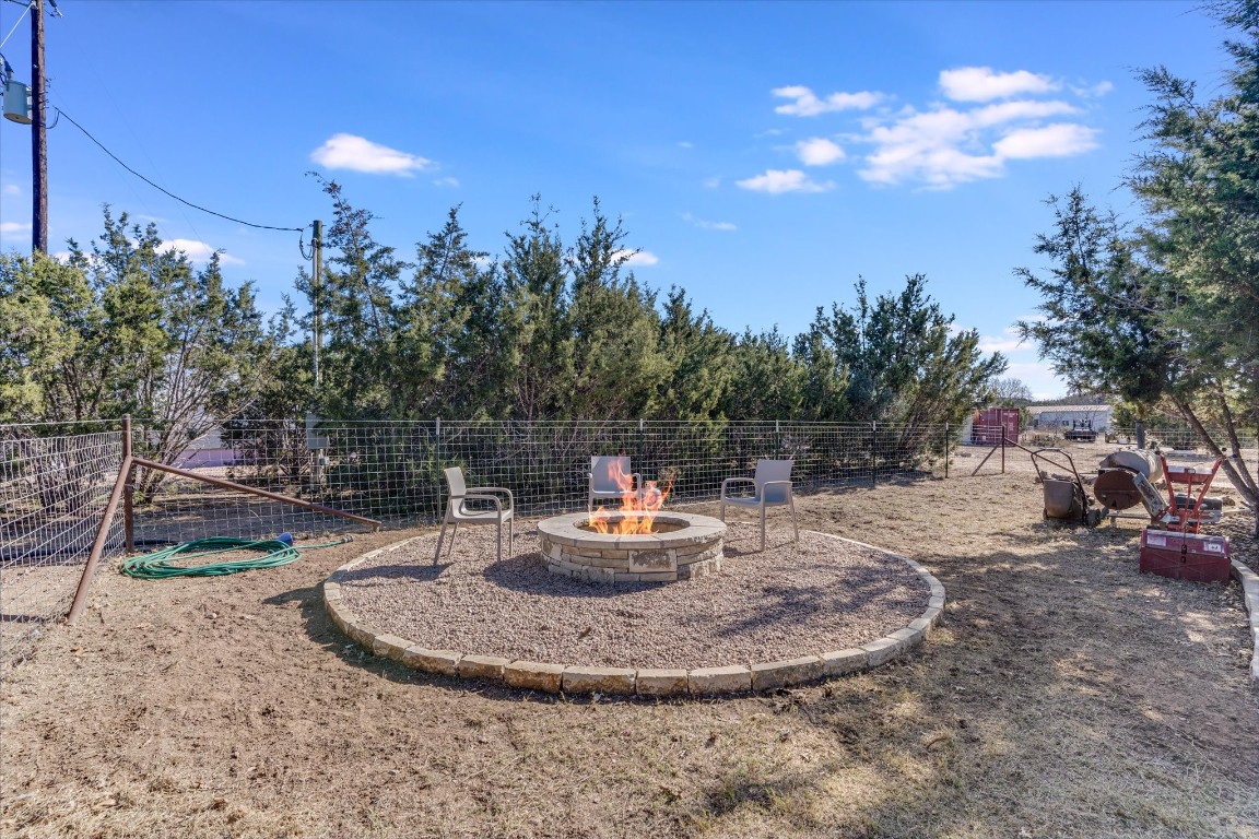 5450 County Road 202 Lampasas, TX 76550 - Photo 14 of 35 View of yard featuring an outdoor fire pit