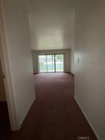 a view of a room that has a window