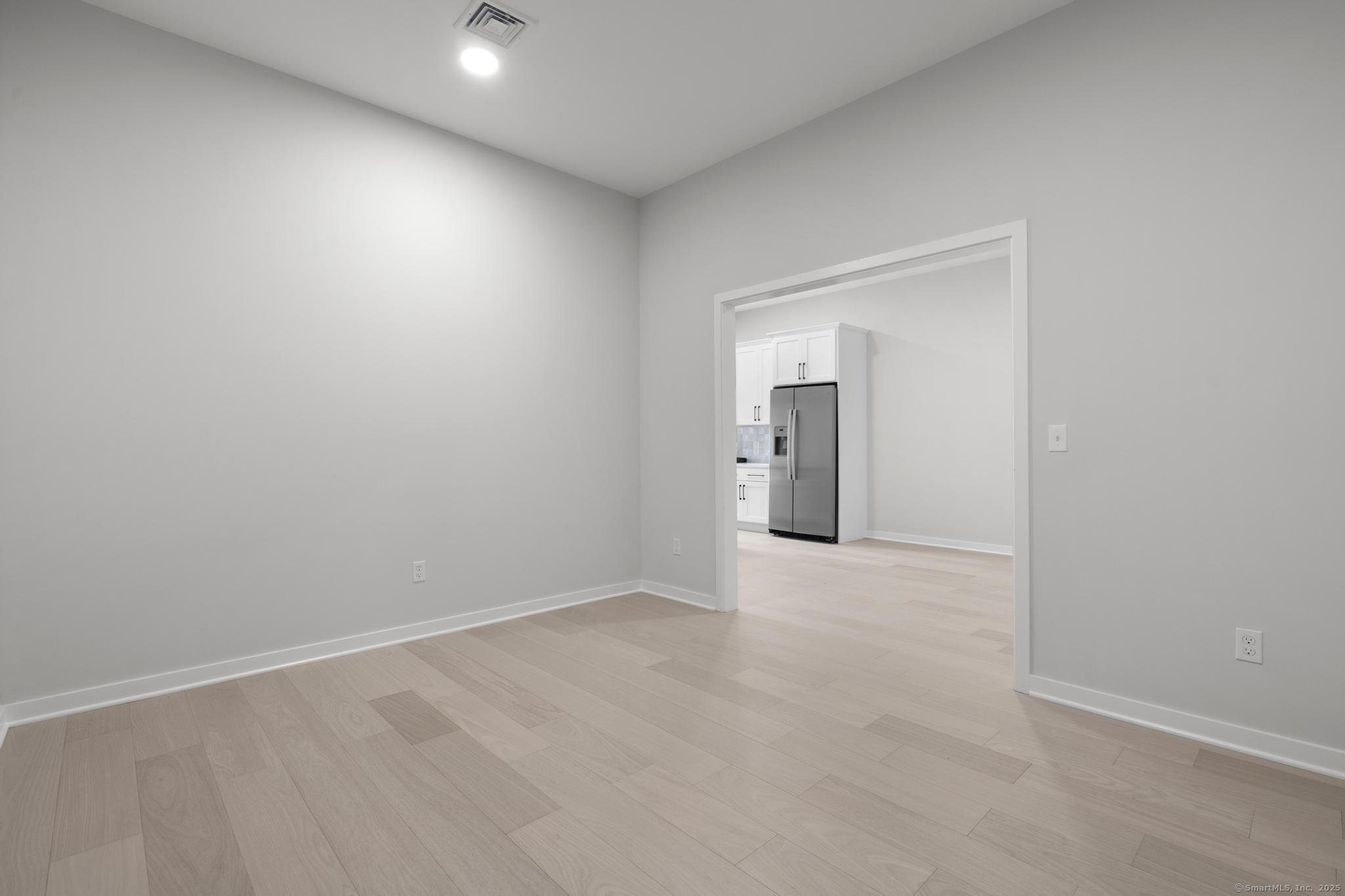 9 John Street Clinton, CT 06413 - Photo 18 of 18 a view of an empty room