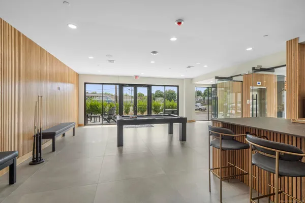 a bathroom with a large tub and shower