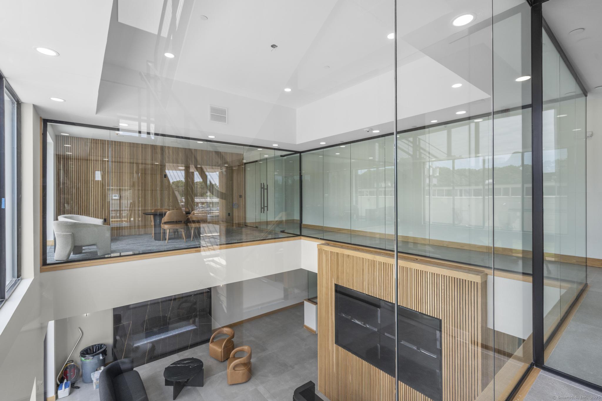 9 John Street Clinton, CT 06413 - Photo 6 of 18 a bathroom with a large tub and shower