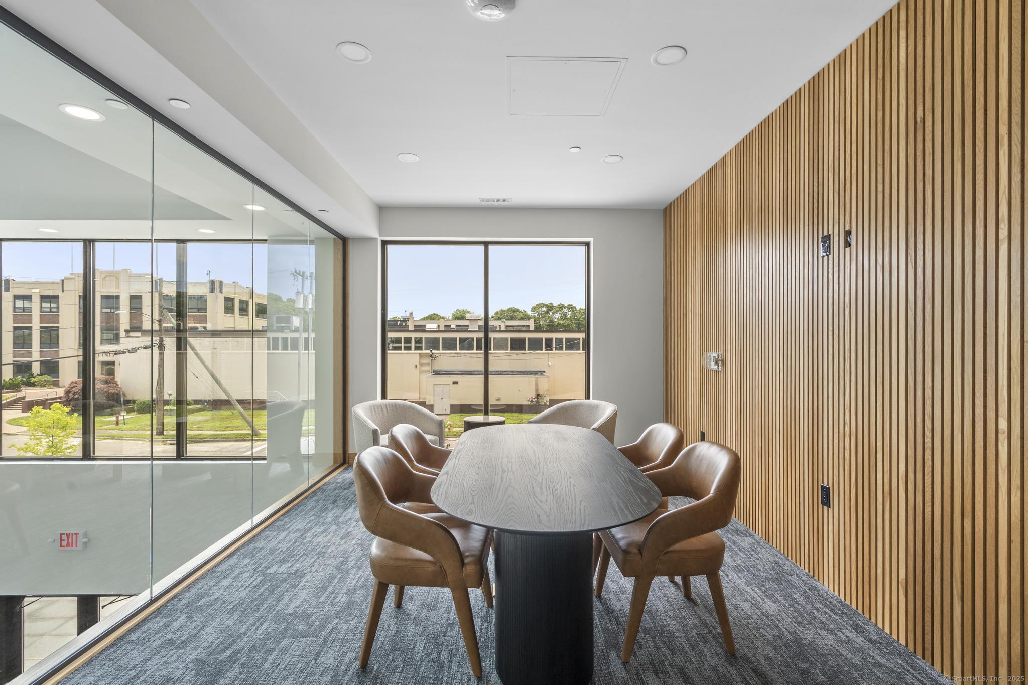 9 John Street Clinton, CT 06413 - Photo 7 of 18 a view of a dining room with furniture window and outside view