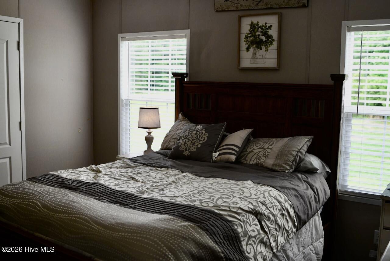 1430 Nixonton Road Elizabeth City, NC 27909 - Photo 17 of 30 Plenty of natural lighting to enhance the primary suite.