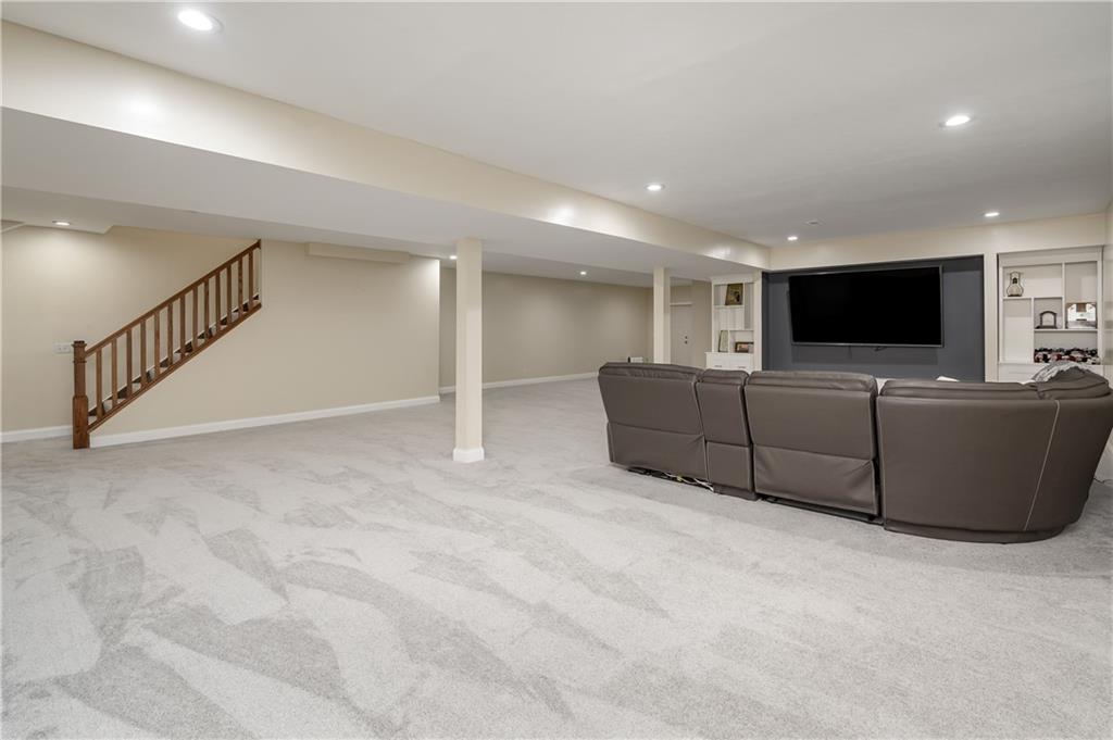117 Dodds Road Butler, PA 16002 - Photo 19 of 25 a living room with furniture and a flat screen tv