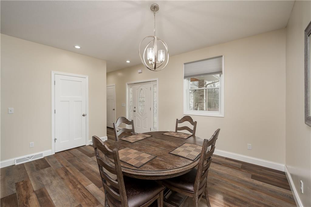 117 Dodds Road Butler, PA 16002 - Photo 5 of 25 a view of a dining room with furniture wooden floor and chandelier