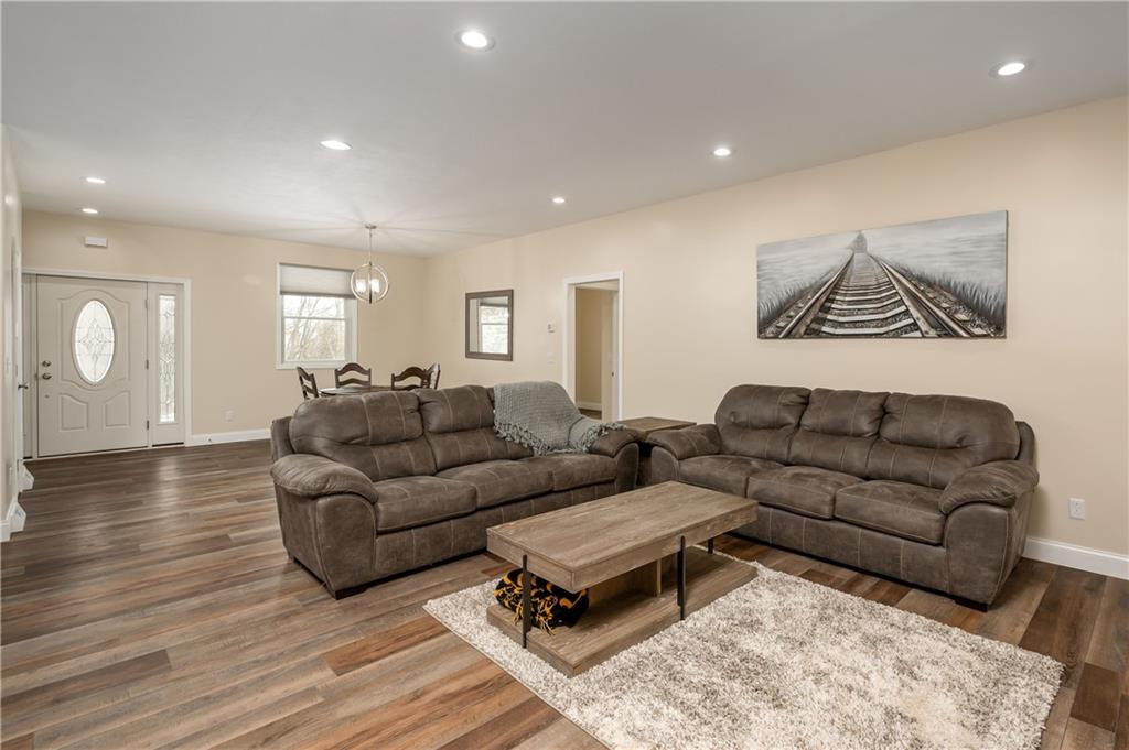 117 Dodds Road Butler, PA 16002 - Photo 8 of 25 a living room with furniture and a wooden floor