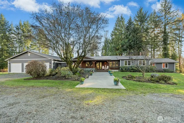 a front view of a house with yard