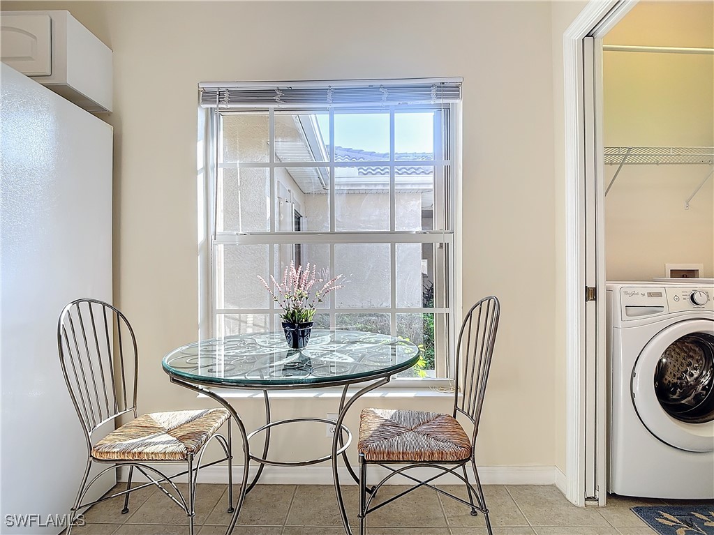 3600 Rue Alec Loop, Unit 4 North Fort Myers, FL 33917 - Photo 11 of 40 a view of a dining room with furniture and wooden floor