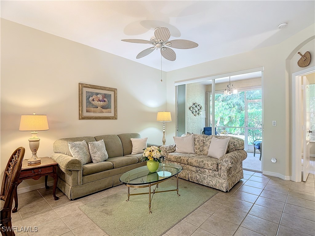 3600 Rue Alec Loop, Unit 4 North Fort Myers, FL 33917 - Photo 16 of 40 a living room with furniture and a large window