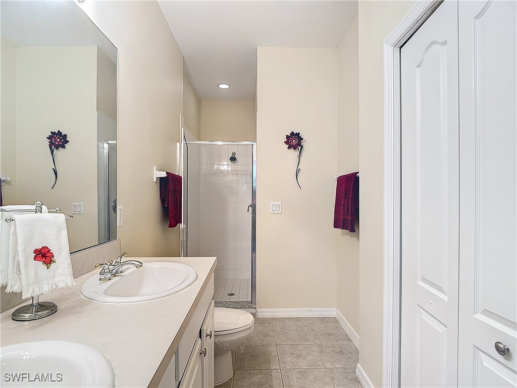 3600 Rue Alec Loop, Unit 4 North Fort Myers, FL 33917 - Photo 20 of 40 a bathroom with a sink and a mirror