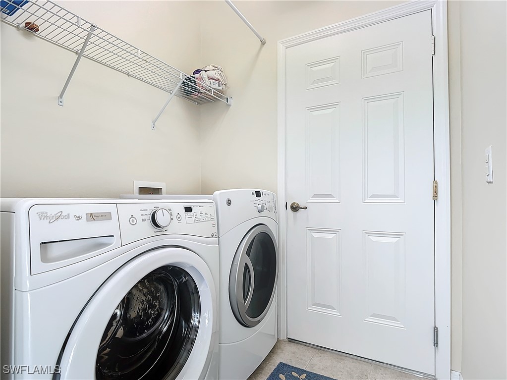 3600 Rue Alec Loop, Unit 4 North Fort Myers, FL 33917 - Photo 23 of 40 a view of a storage & utility room with dryer and washer