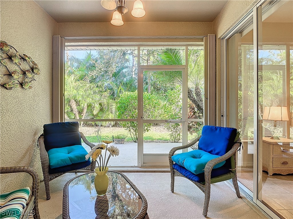 3600 Rue Alec Loop, Unit 4 North Fort Myers, FL 33917 - Photo 24 of 40 a living room with furniture and a potted plant