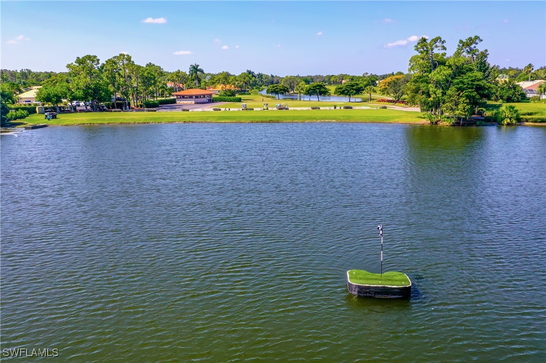 3600 Rue Alec Loop, Unit 4 North Fort Myers, FL 33917 - Photo 39 of 40 a view of a lake with a house