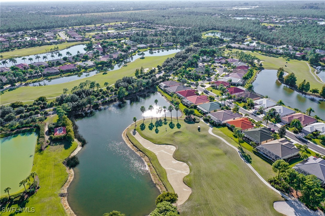3600 Rue Alec Loop, Unit 4 North Fort Myers, FL 33917 - Photo 40 of 40 an aerial view of a house with a garden and lake view