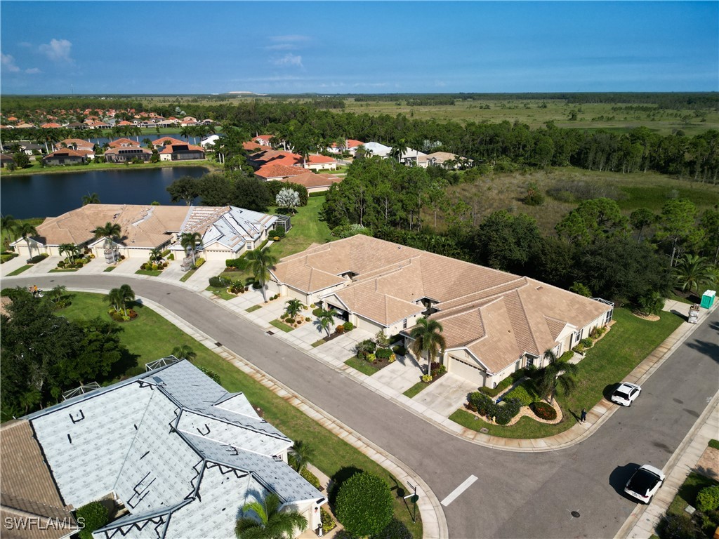 3600 Rue Alec Loop, Unit 4 North Fort Myers, FL 33917 - Photo 4 of 40 an aerial view of a house with outdoor space