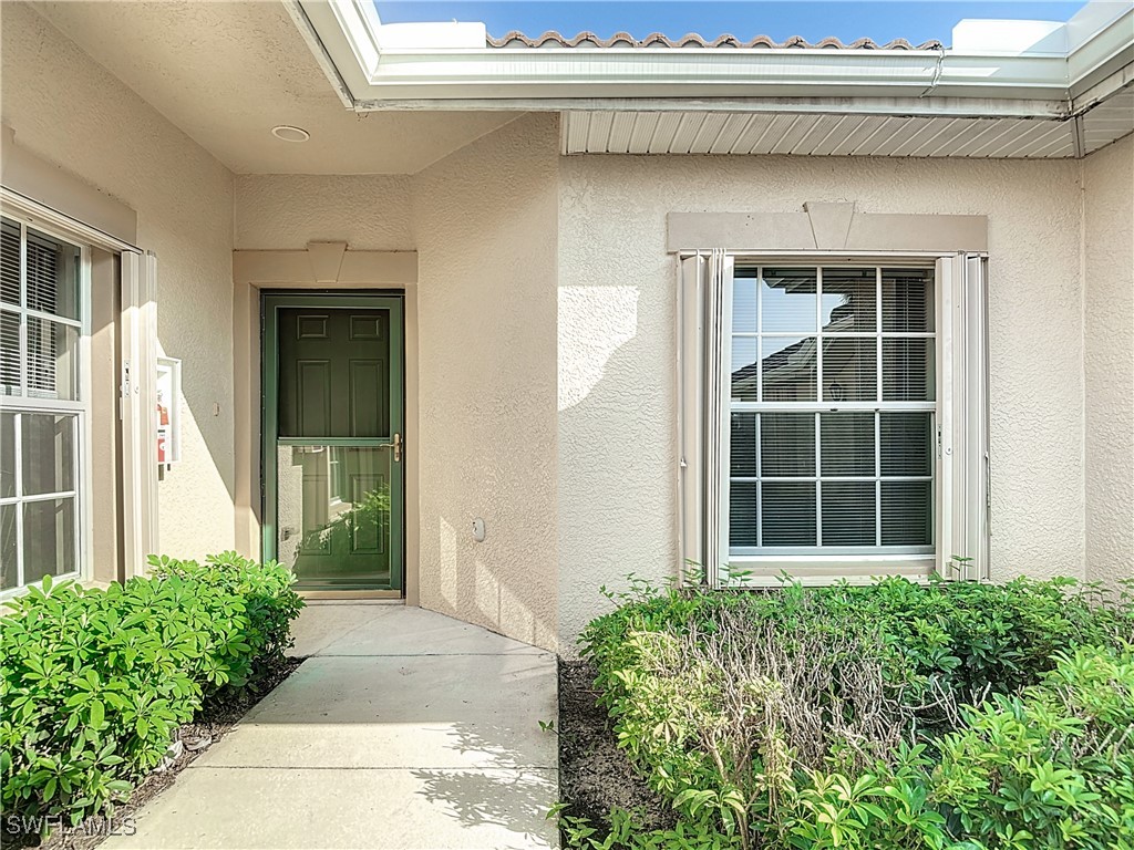 3600 Rue Alec Loop, Unit 4 North Fort Myers, FL 33917 - Photo 6 of 40 a view of front door of house