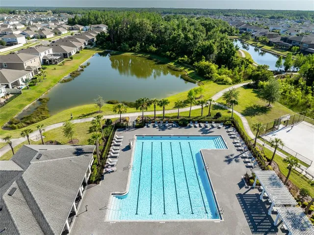 a view of swimming pool with a garden
