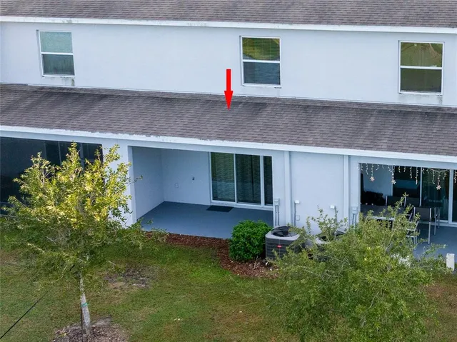 a house view with a garden space