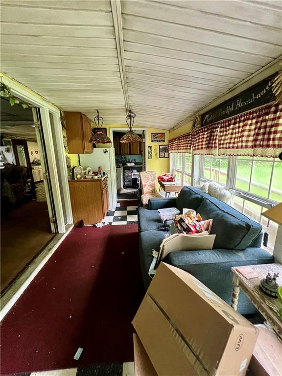 192 Hawkins Hollow Road Connellsville, PA 15425 - Photo 10 of 16 a living room with furniture and a flat screen tv