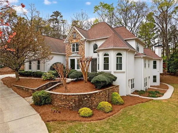 a view of a house with snow on the ground