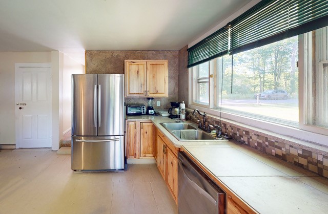 597 Greenough Road Hartwick, NY 13326 - Photo 4 of 19 !st floor kitchen with stainless appliances