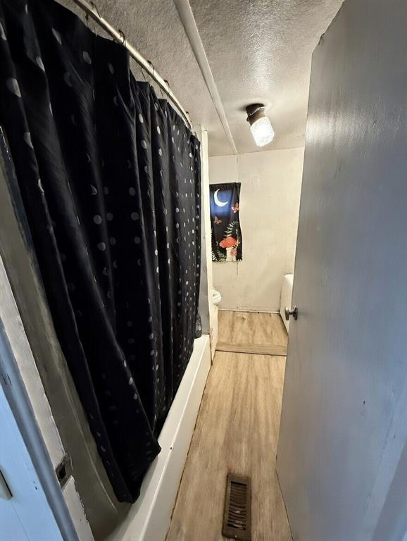 7443 Anderlan Road The Colony, TX 75056 - Photo 11 of 15 a bathroom with a sink and a mirror