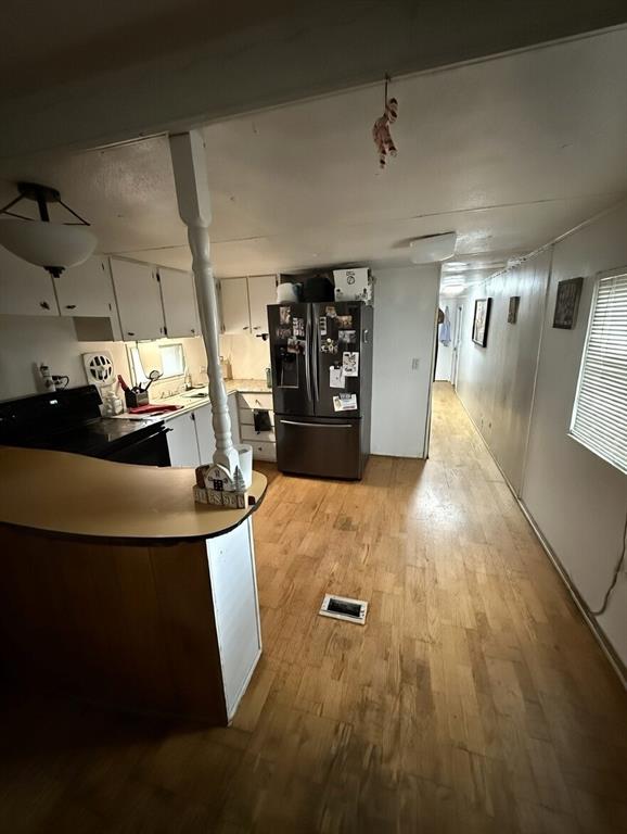 7443 Anderlan Road The Colony, TX 75056 - Photo 15 of 15 a view of a living room and a garage