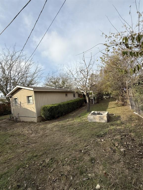 7443 Anderlan Road The Colony, TX 75056 - Photo 4 of 15 a view of a house with a yard