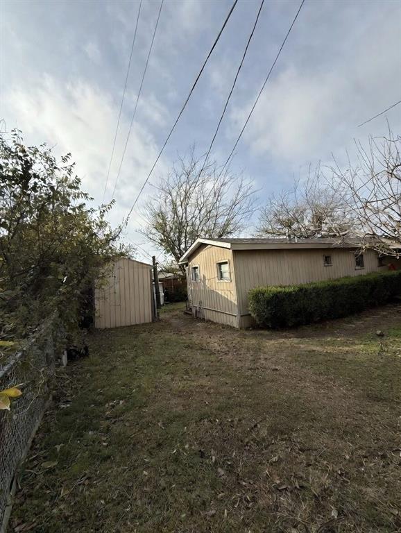 7443 Anderlan Road The Colony, TX 75056 - Photo 5 of 15 a view of a backyard