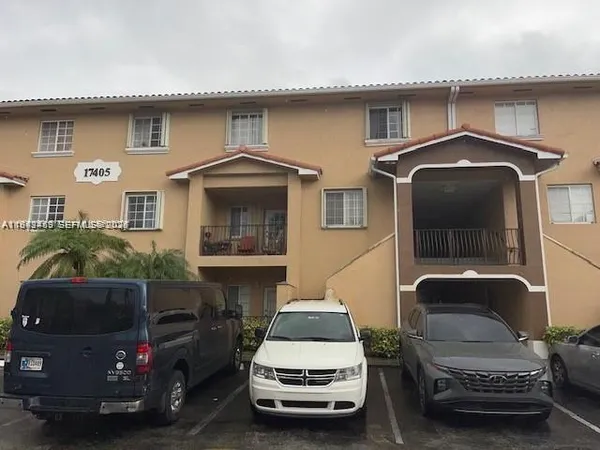 a car parked in front of a house