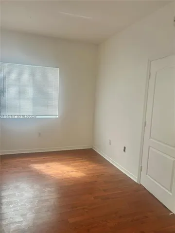 an empty room with a natural light