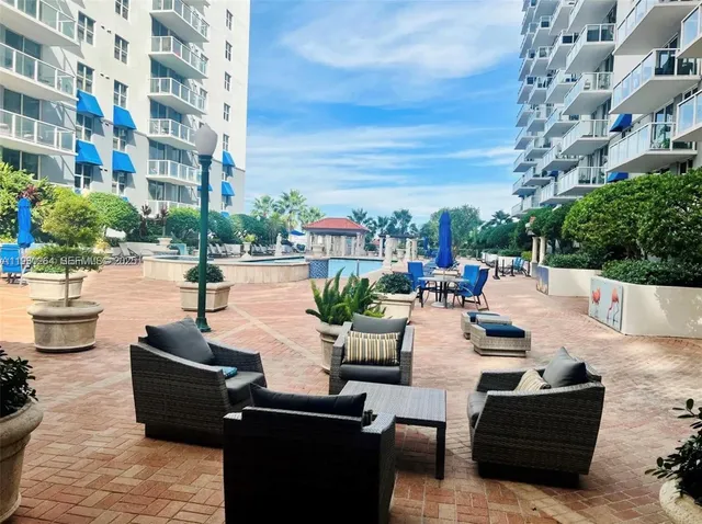 a view of tall building with outdoor view