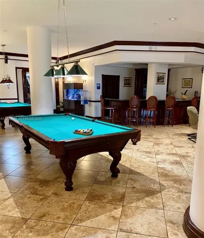 a room with furniture and a flat screen tv