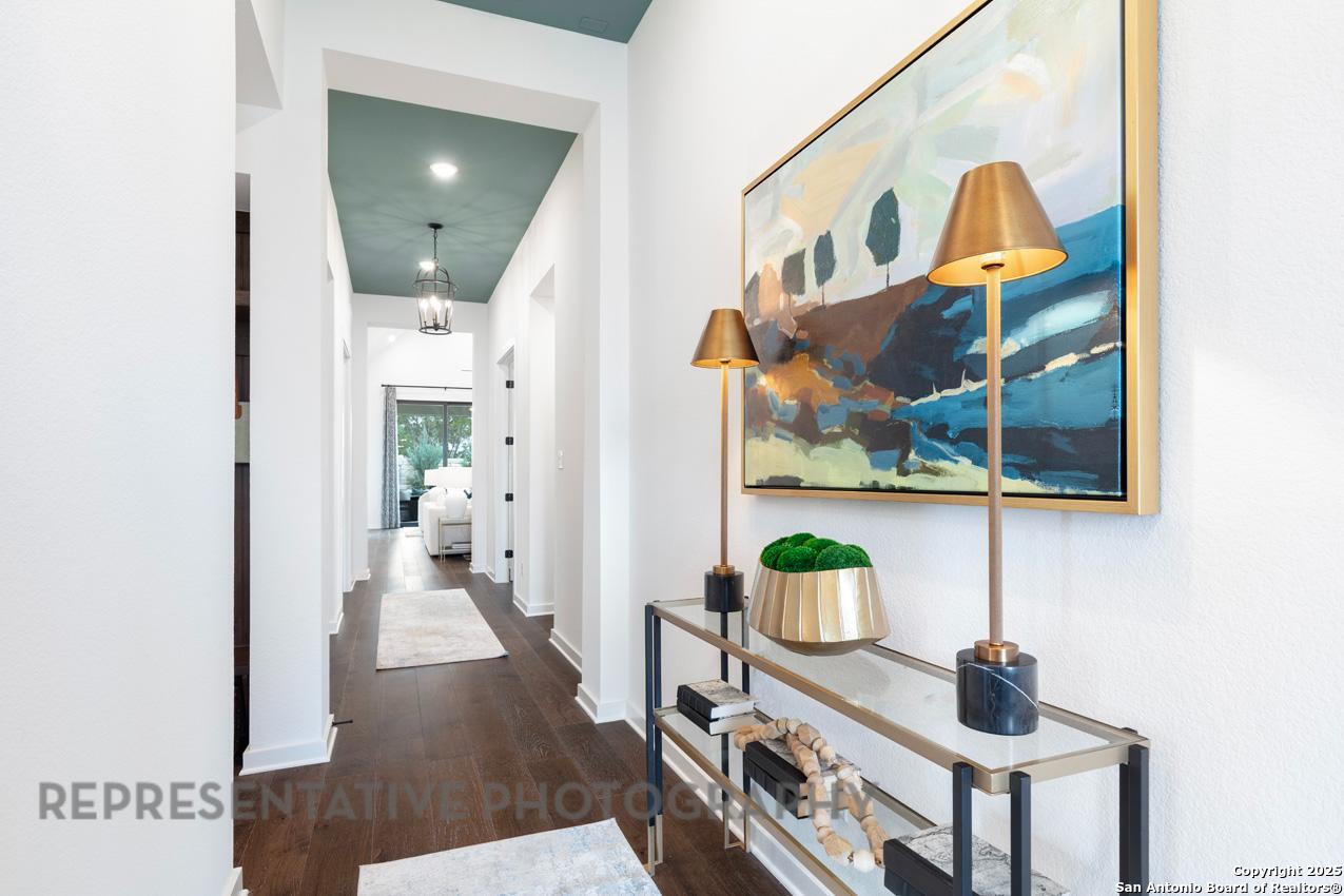 235 Boulder Creek Boerne, TX 78006 - Photo 23 of 40 a view of living room with furniture and wooden floor