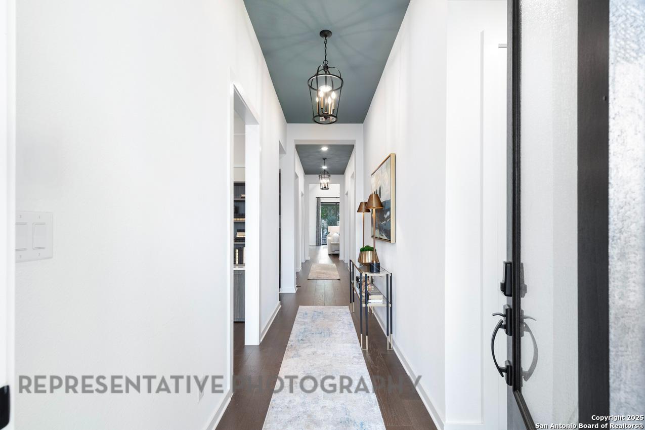 235 Boulder Creek Boerne, TX 78006 - Photo 24 of 40 a view of hallway with furniture