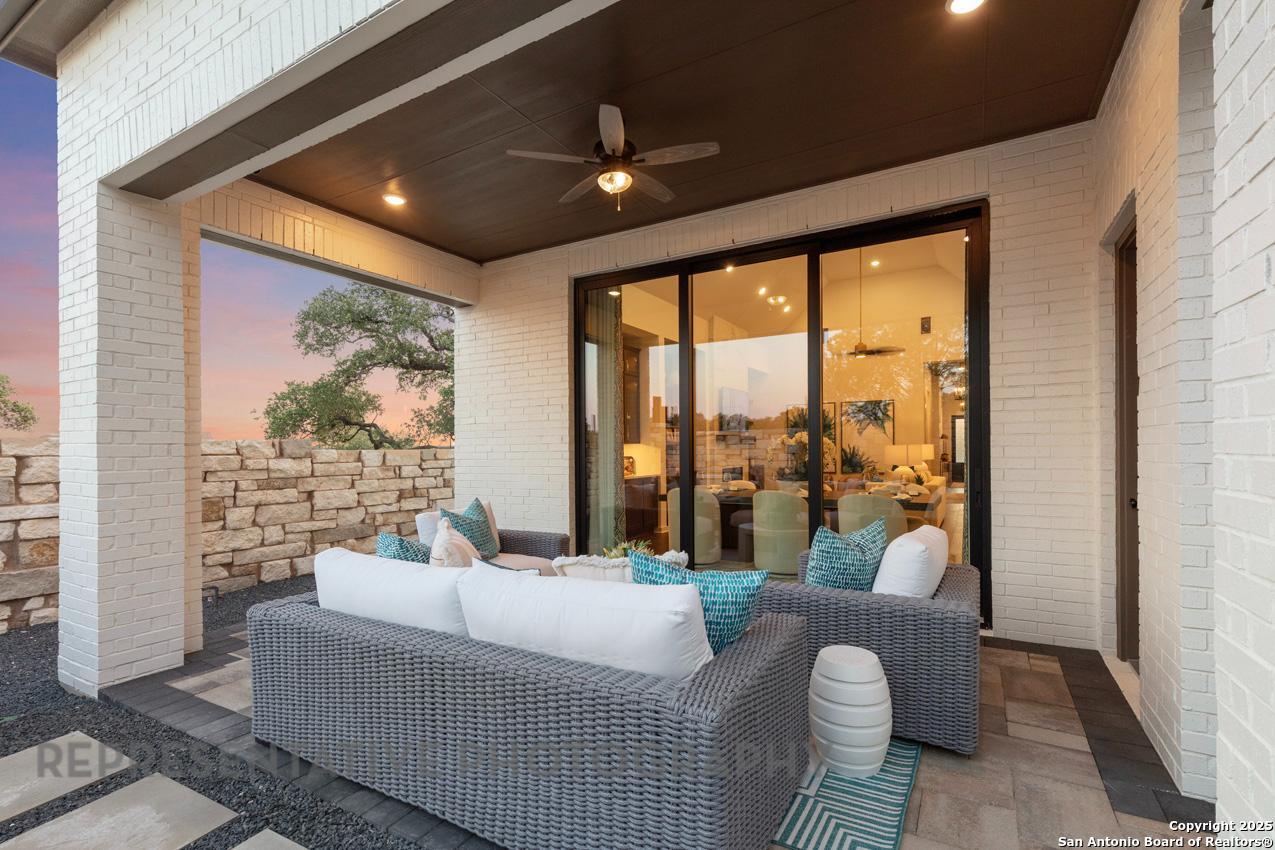 235 Boulder Creek Boerne, TX 78006 - Photo 37 of 40 a living room with furniture and a large window