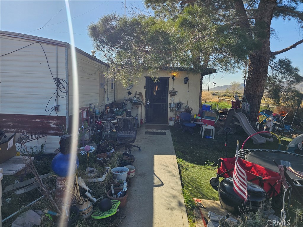 30423 Desert View Road Lucerne Valley, CA 92356 - Photo 2 of 4 a view of yard with outdoor seating