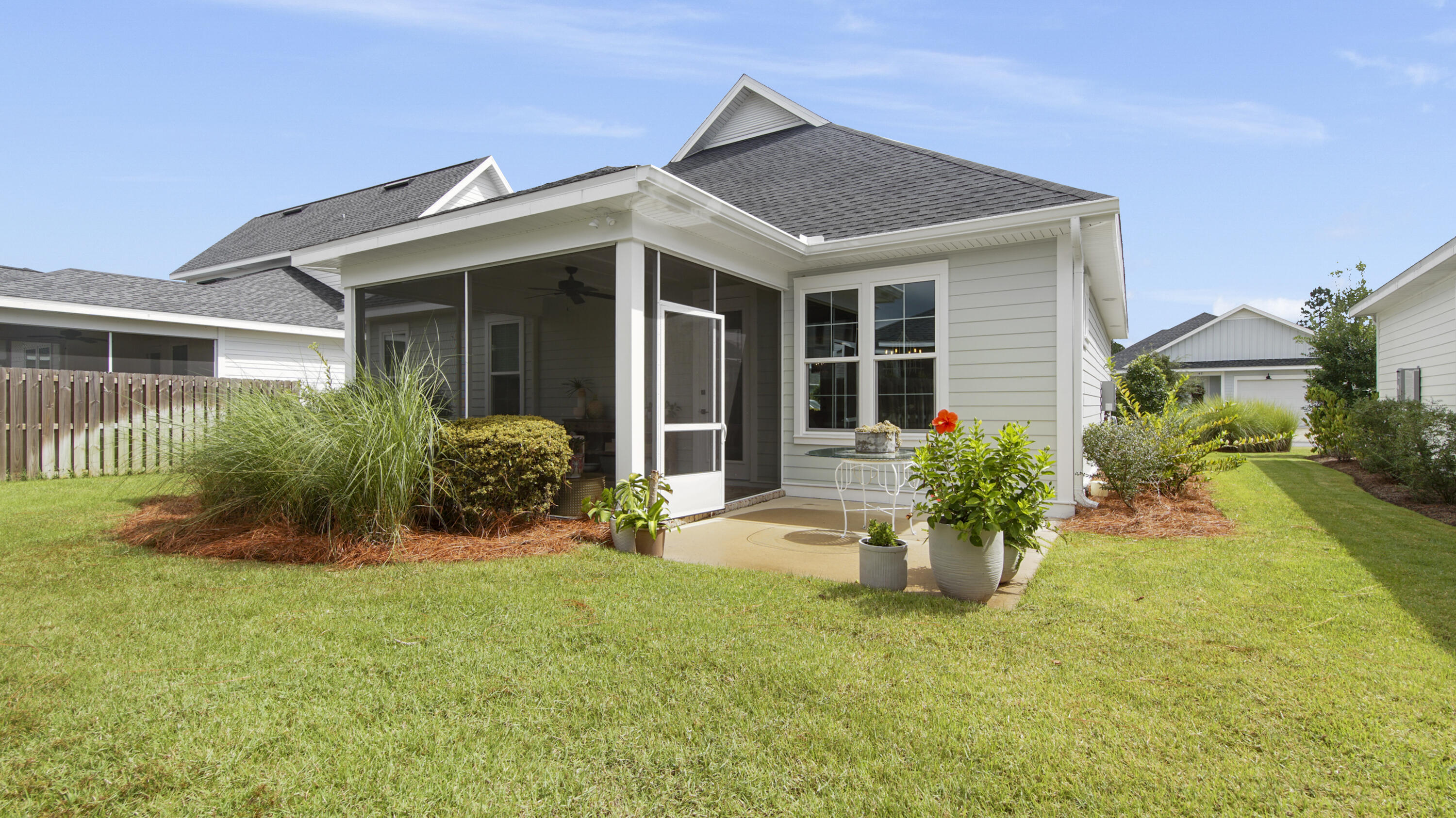 40 Conifer Ct Inlet Beach Inlet Beach, FL 32461 - Photo 24 of 25 front view of a house with a yard