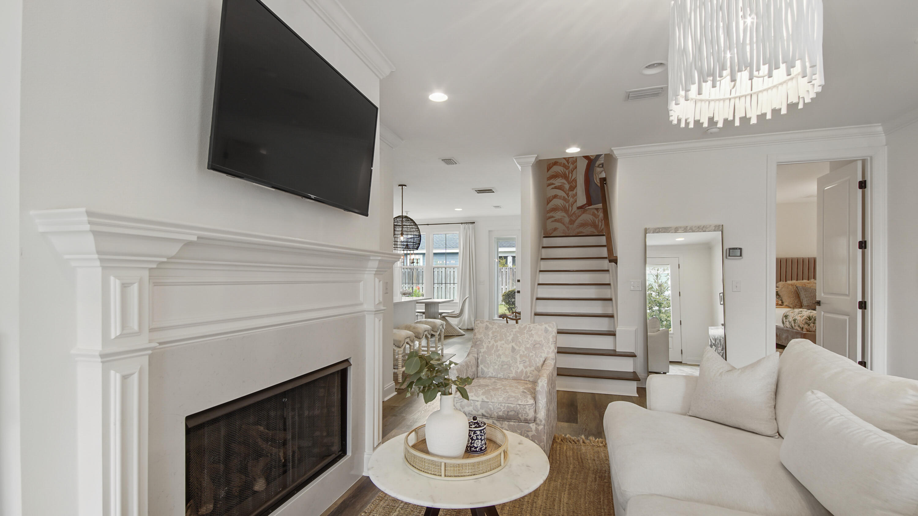 40 Conifer Ct Inlet Beach Inlet Beach, FL 32461 - Photo 4 of 25 a living room with furniture a fireplace and a flat screen tv