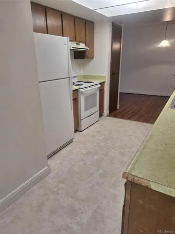a view of a kitchen with a sink