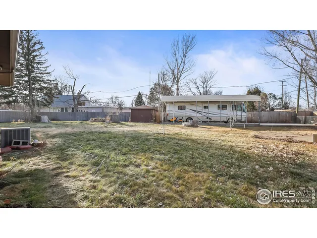 a aerial view of a house with a swimming pool