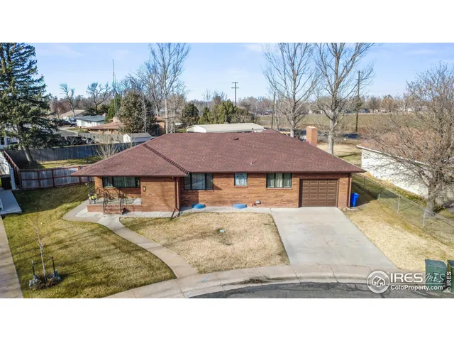 a black and white photo of a house