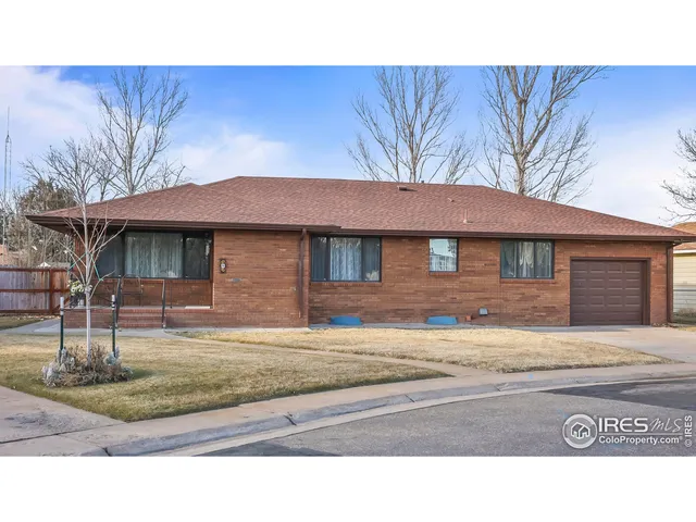 a black and white photo of a house