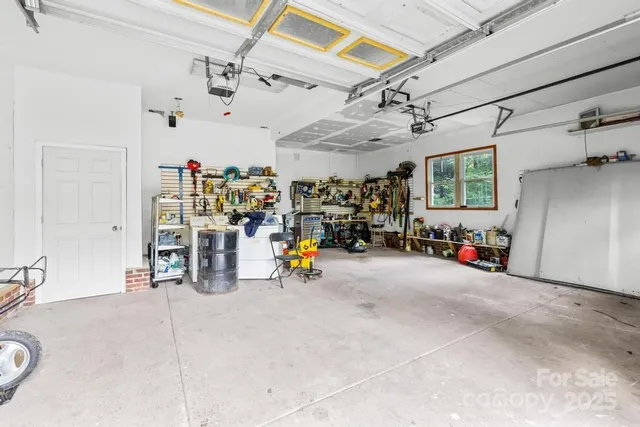 a view of the garage with gym equipment