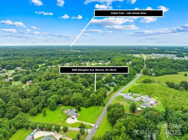 a view of a back yard from a balcony