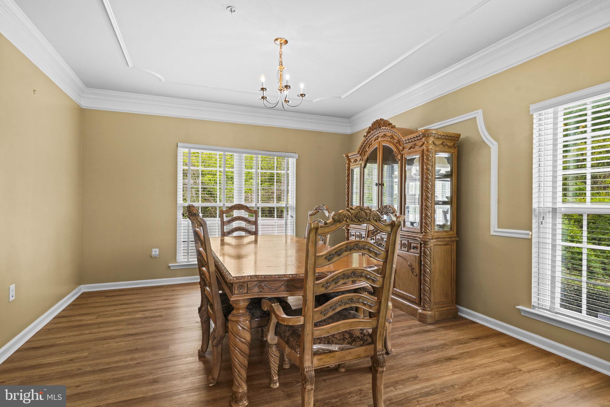 1507 St Albans Lane Accokeek, MD 20607 - Photo 11 of 36 a view of a dining room with furniture window and wooden floor