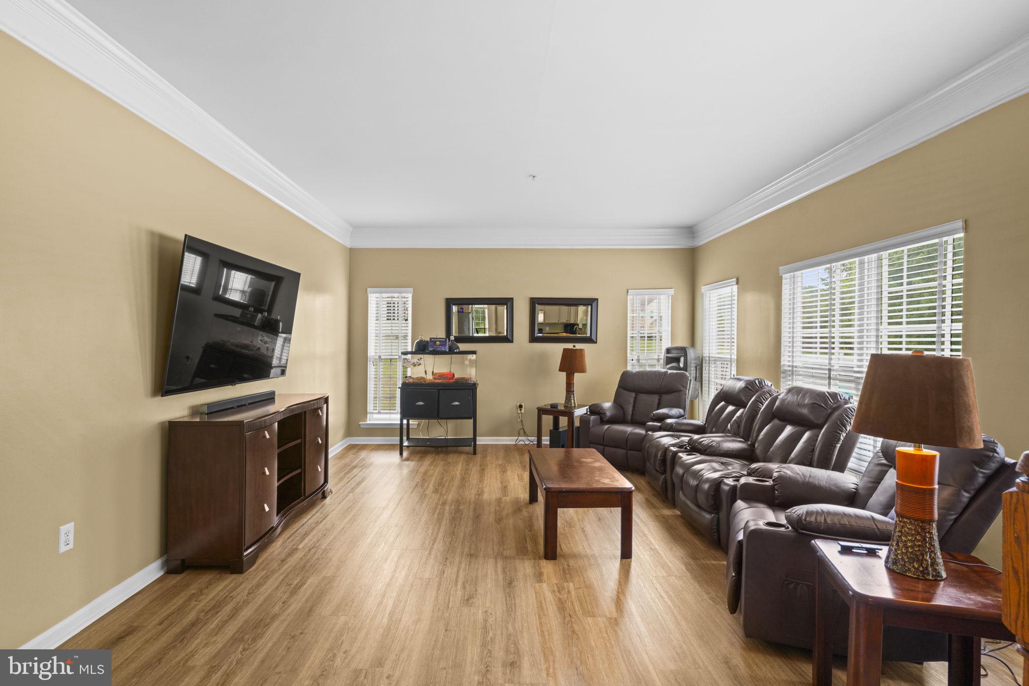 1507 St Albans Lane Accokeek, MD 20607 - Photo 19 of 36 a living room with furniture and a flat screen tv