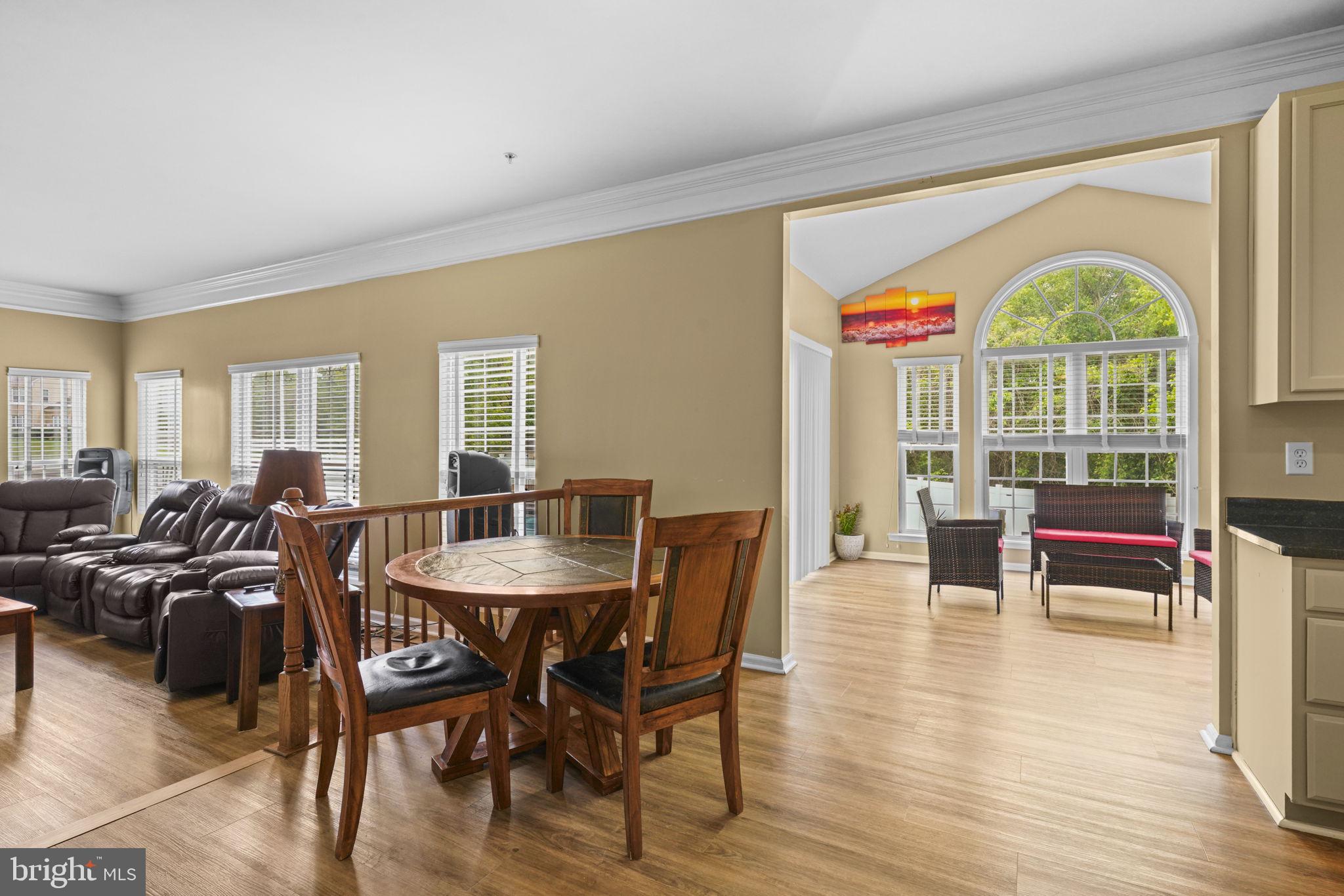 1507 St Albans Lane Accokeek, MD 20607 - Photo 20 of 36 a view of a dining room with furniture window and outside view