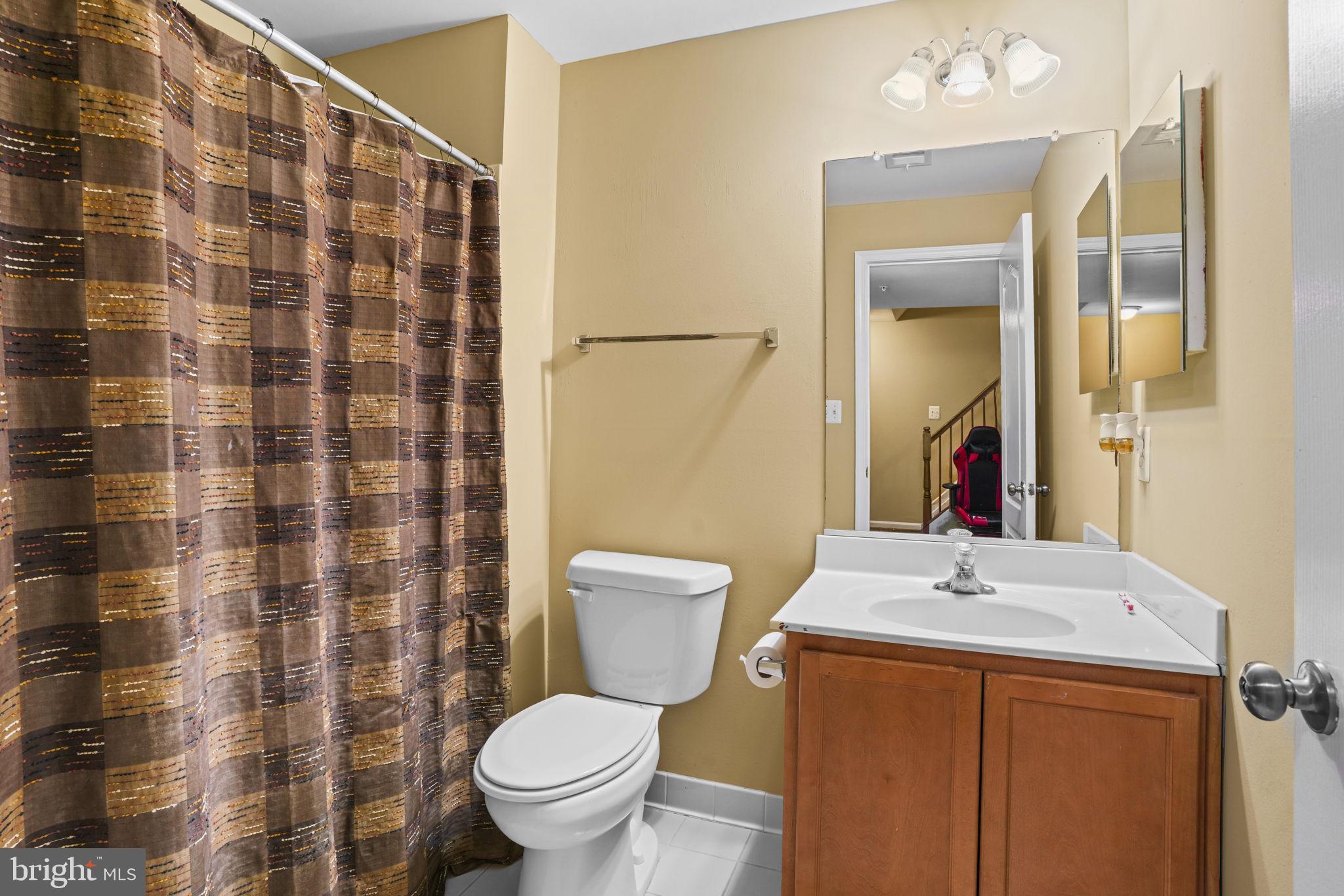 1507 St Albans Lane Accokeek, MD 20607 - Photo 24 of 36 a bathroom with a sink toilet and shower