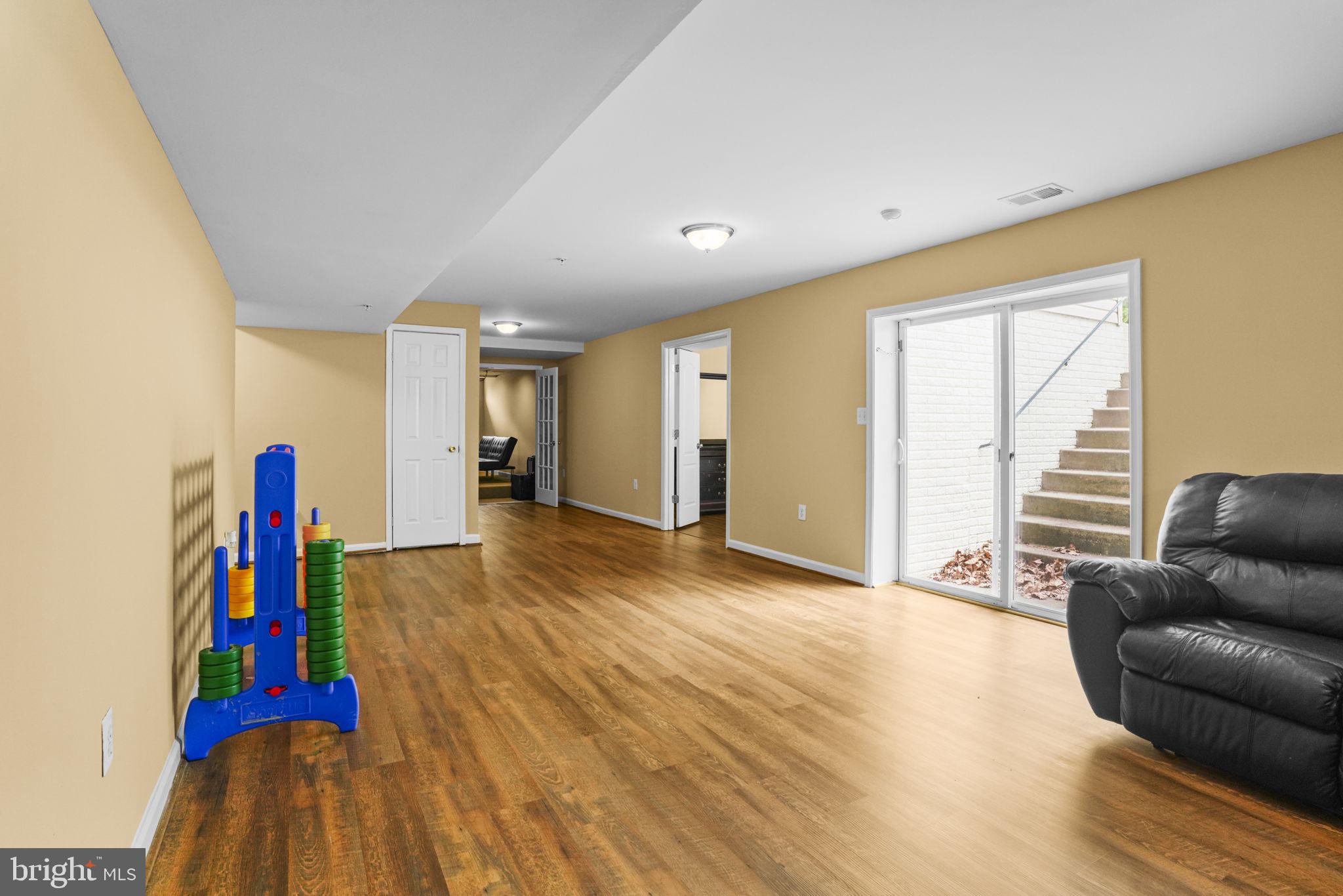 1507 St Albans Lane Accokeek, MD 20607 - Photo 26 of 36 a view of livingroom with furniture and wooden floor